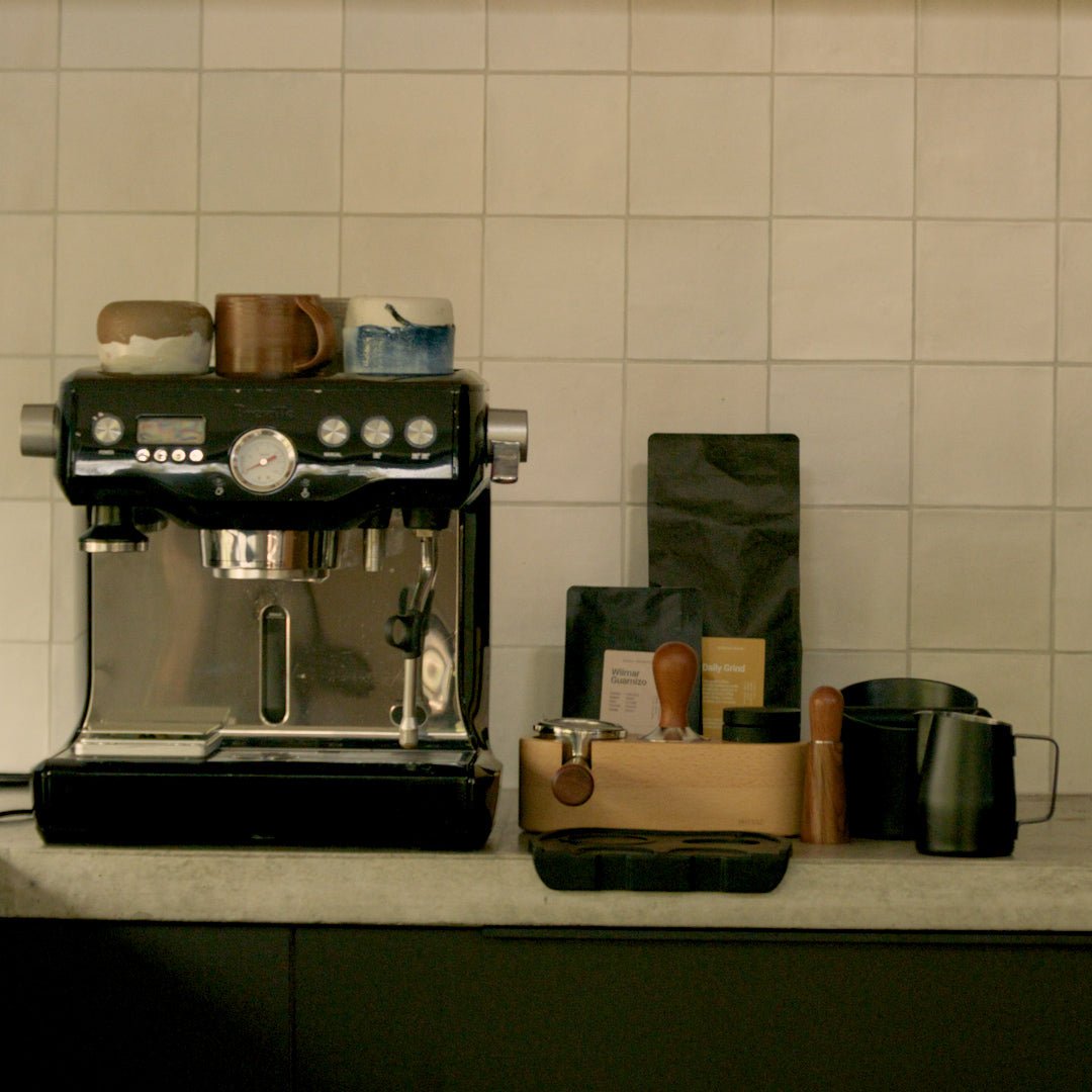 Home espresso machine with best-selling barista accessories on a benchtop